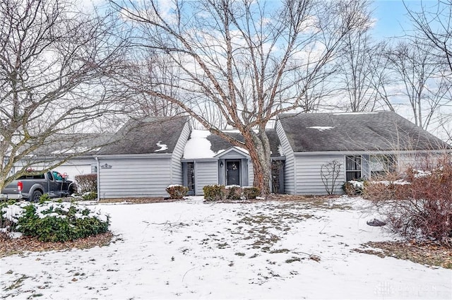 single story home with a garage