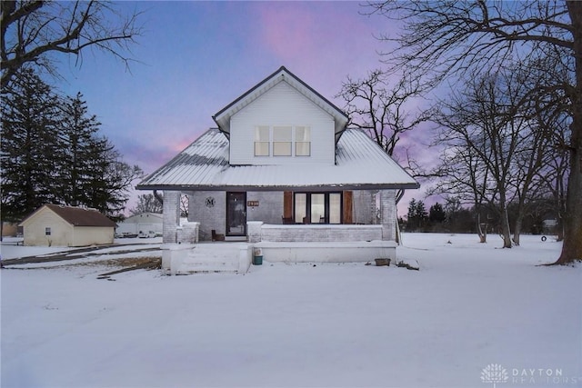 view of front of home featuring brick siding