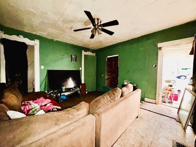 living room with a ceiling fan