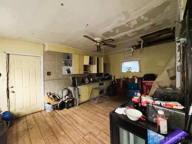 interior space featuring a ceiling fan and light wood-style flooring