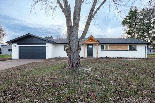 ranch-style home with an attached garage, brick siding, concrete driveway, a chimney, and a front yard