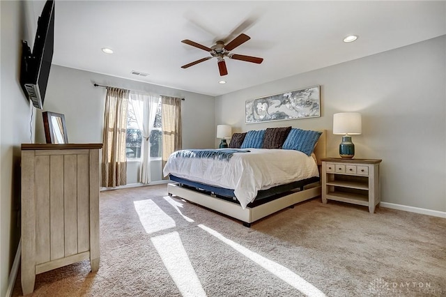 bedroom featuring recessed lighting, light carpet, and visible vents