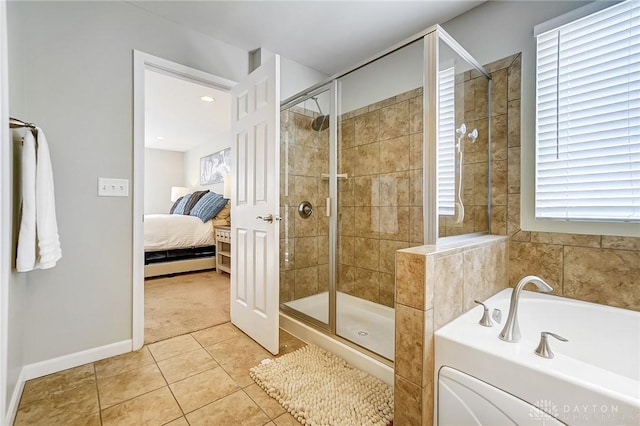 ensuite bathroom featuring baseboards, connected bathroom, tile patterned floors, a shower stall, and a bath