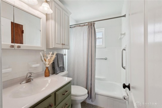 bathroom featuring backsplash, vanity, toilet, and shower / tub combo with curtain