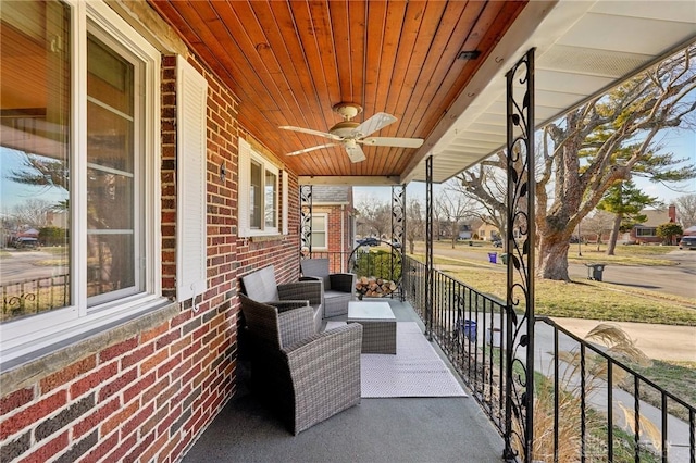 view of patio / terrace featuring a ceiling fan and a porch