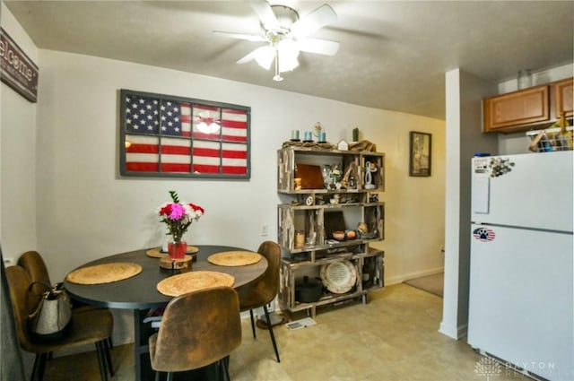 dining space featuring ceiling fan