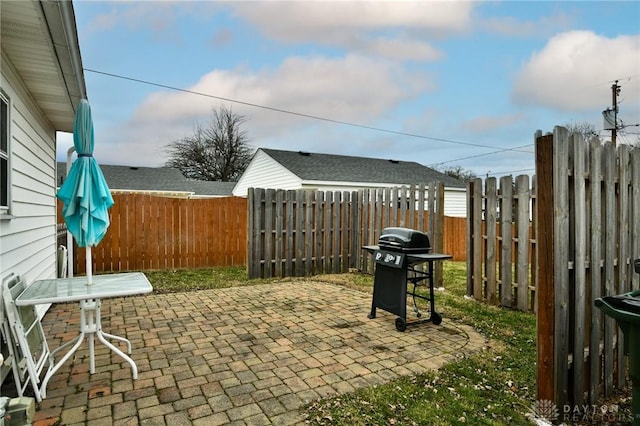 view of patio / terrace featuring a fenced backyard and area for grilling