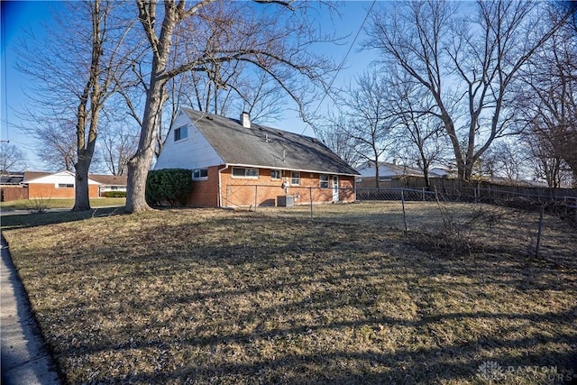 view of yard featuring cooling unit and fence