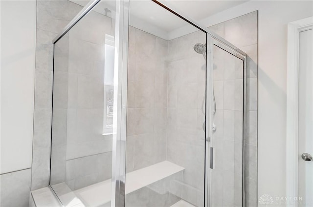 bathroom featuring a stall shower