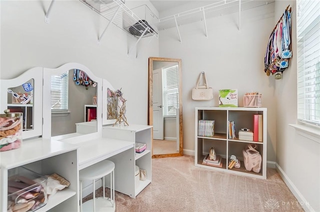 game room with carpet floors and baseboards