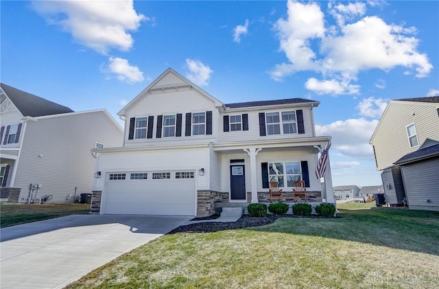 craftsman-style home with a porch, an attached garage, board and batten siding, a front yard, and driveway