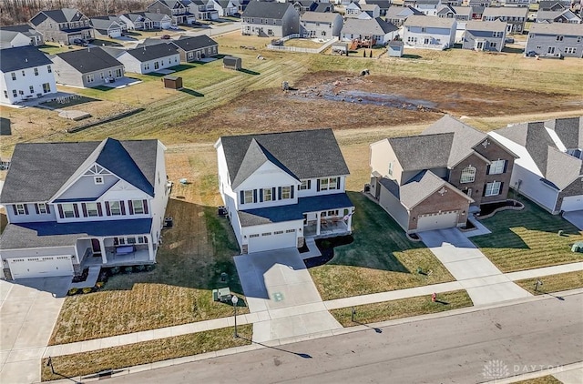 drone / aerial view with a residential view