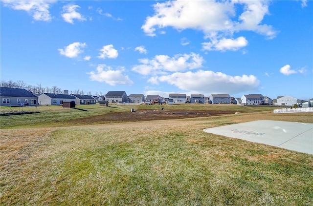 view of yard featuring a residential view