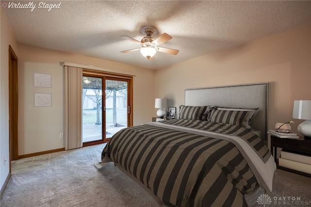 bedroom with access to outside, carpet flooring, a textured ceiling, and baseboards