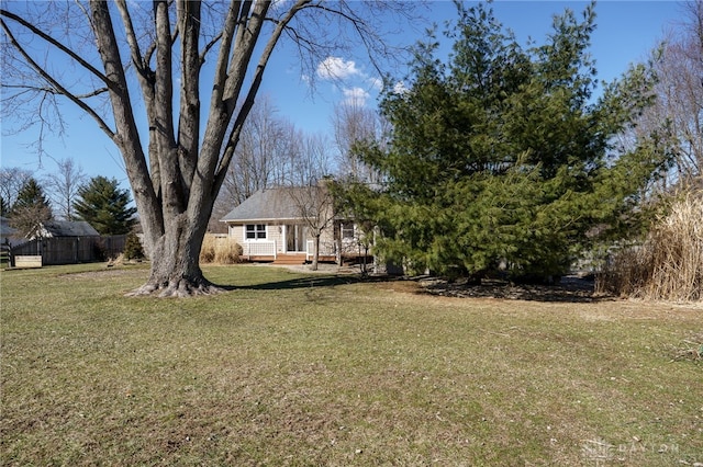 view of yard featuring fence