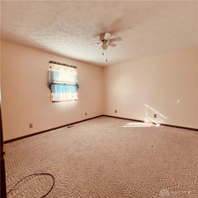 1181/2 Springlake Ave Middle, Unit Middle, Hillsboro, OH 45133 - carpeted empty room featuring a ceiling fan and a textured ceiling