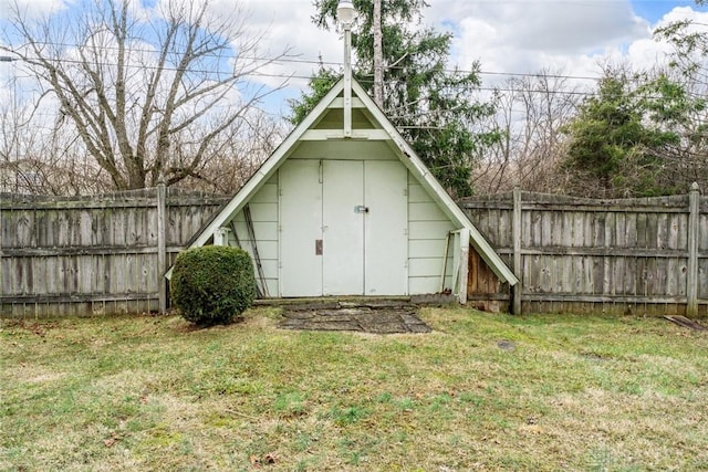 view of shed featuring fence private yard