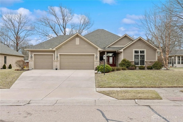 view of front facade with a garage, brick siding, concrete driveway, roof with shingles, and a front yard