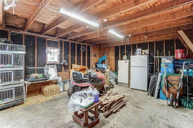 interior space featuring freestanding refrigerator