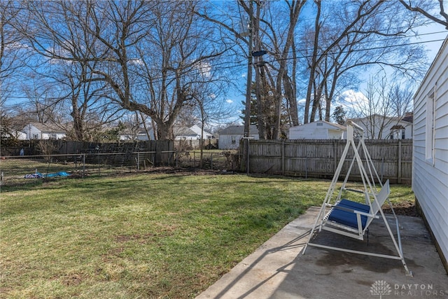 view of yard featuring a patio and a fenced backyard