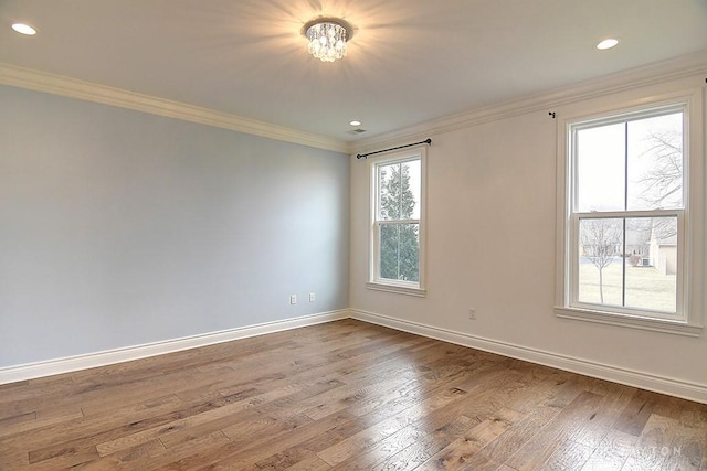 9471 Banyan Ct, Dayton, OH 45458 - unfurnished room featuring baseboards, hardwood / wood-style floors, recessed lighting, and crown molding