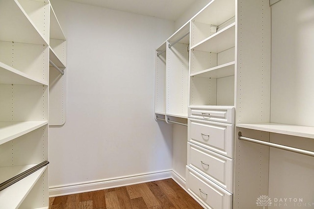 9471 Banyan Ct, Dayton, OH 45458 - walk in closet featuring dark wood-style flooring
