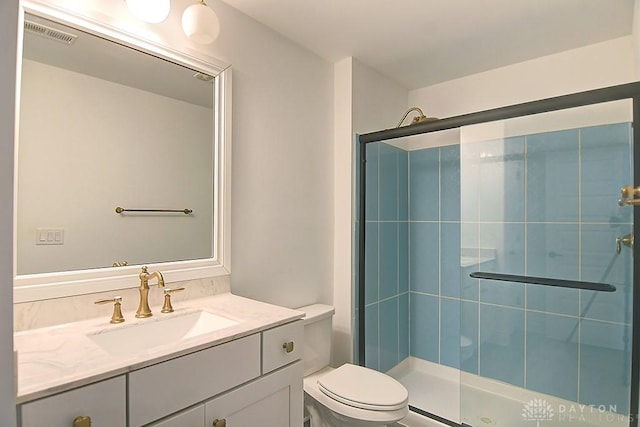 9471 Banyan Ct, Dayton, OH 45458 - full bathroom with toilet, a stall shower, visible vents, and vanity