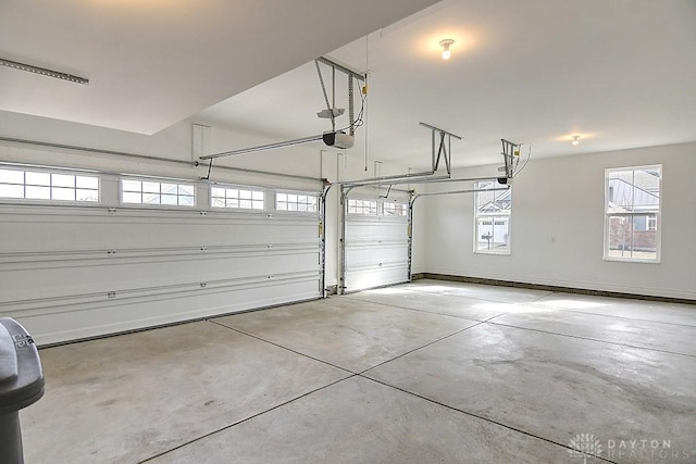 9471 Banyan Ct, Dayton, OH 45458 - garage with baseboards and a garage door opener
