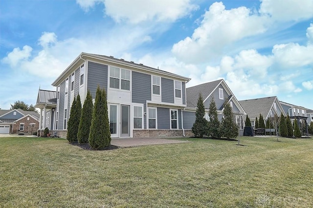 9471 Banyan Ct, Dayton, OH 45458 - back of house featuring a residential view, brick siding, and a lawn