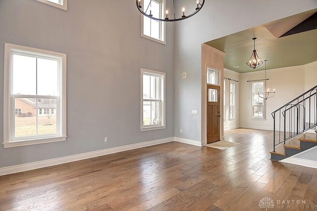 9471 Banyan Ct, Dayton, OH 45458 - foyer entrance with a chandelier, plenty of natural light, and stairs