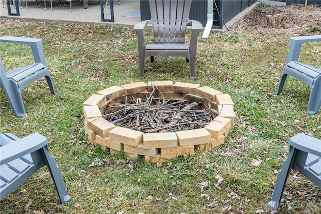 exterior details with a fire pit