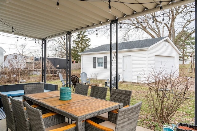 view of patio / terrace featuring outdoor dining area and an outdoor structure