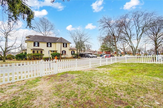 view of yard with a fenced front yard