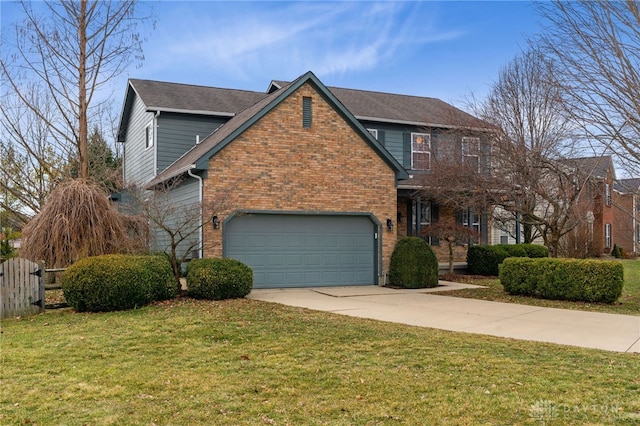 traditional-style house featuring brick siding, a front yard, fence, a garage, and driveway