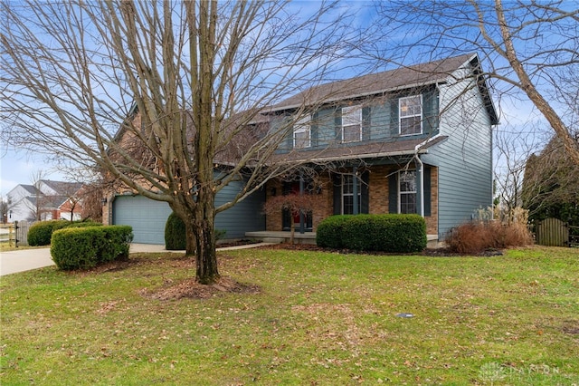 traditional-style home with a porch, an attached garage, brick siding, driveway, and a front yard