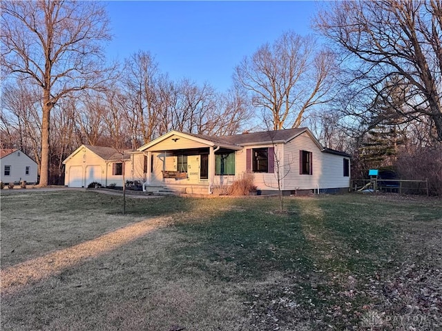 view of front of property with covered porch and a front yard