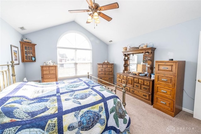 bedroom featuring light colored carpet, visible vents, vaulted ceiling, ceiling fan, and baseboards