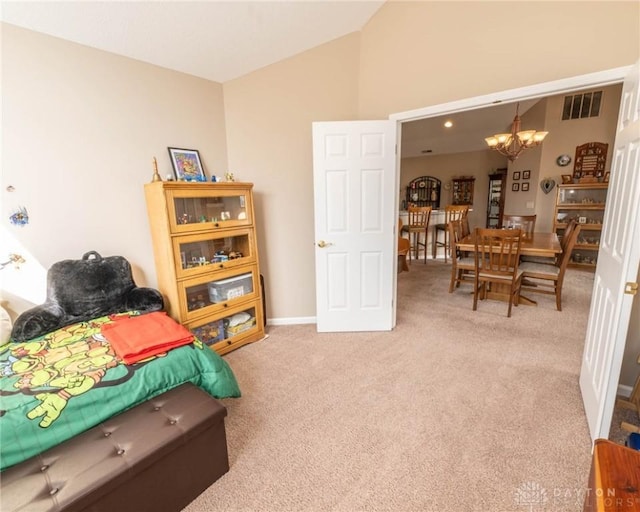 interior space with lofted ceiling, carpet flooring, visible vents, baseboards, and an inviting chandelier