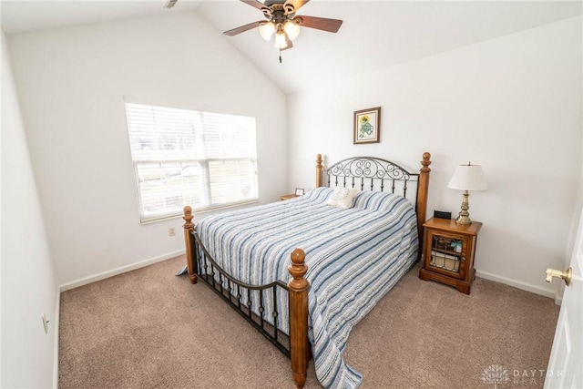 carpeted bedroom featuring lofted ceiling, ceiling fan, and baseboards