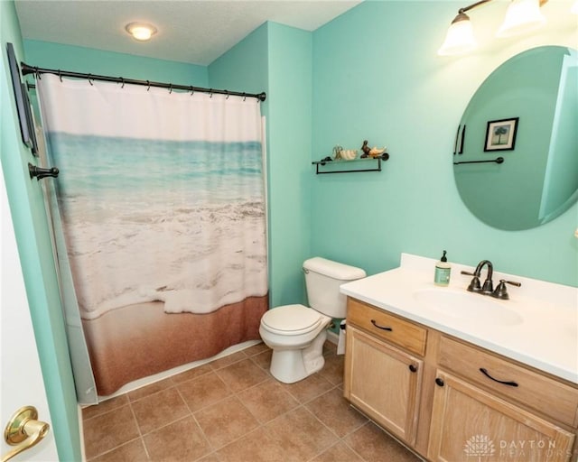 bathroom with toilet, tile patterned flooring, a shower with shower curtain, and vanity