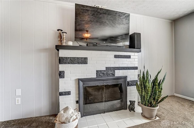 room details with carpet, a fireplace, and a textured ceiling