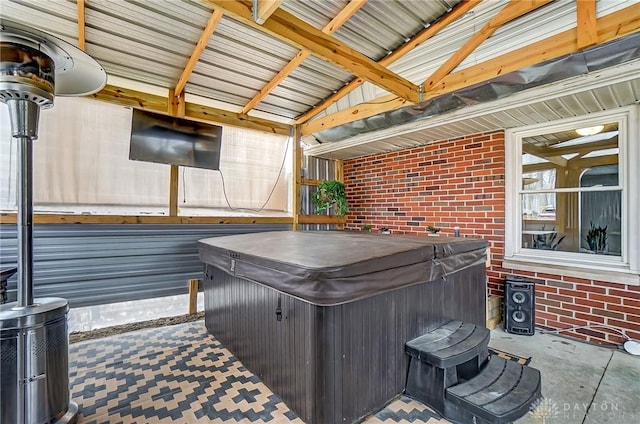 view of patio / terrace featuring an indoor hot tub