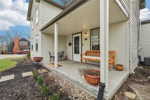 doorway to property featuring covered porch