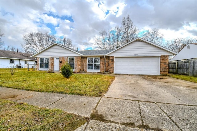 ranch-style house with driveway, brick siding, a front lawn, and an attached garage