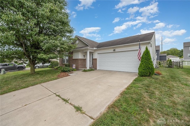 view of front of property with a garage, brick siding, concrete driveway, and a front yard