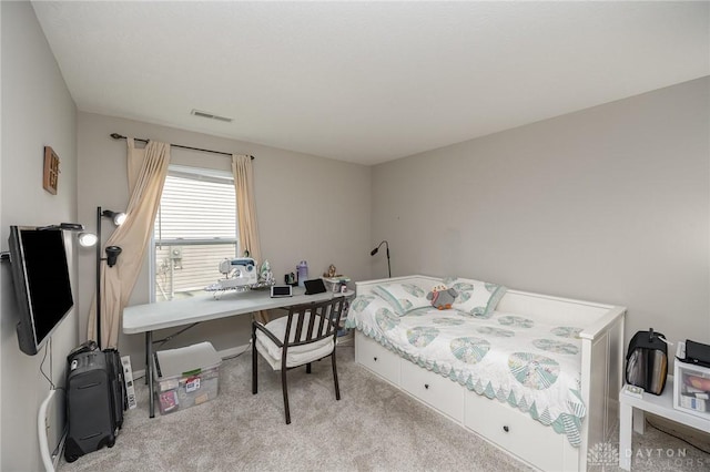 bedroom featuring carpet floors and visible vents