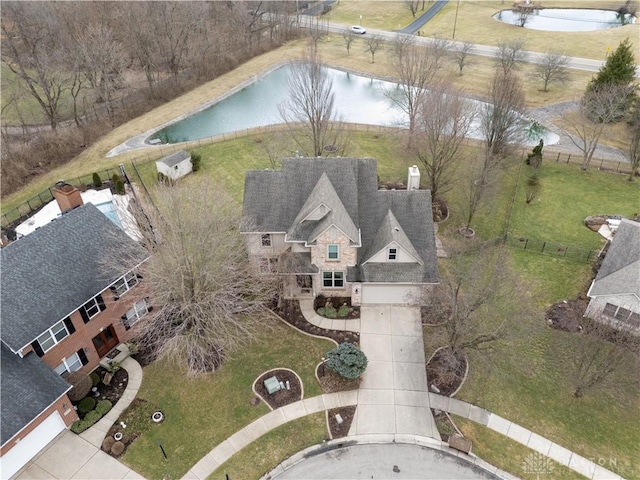 drone / aerial view with a water view