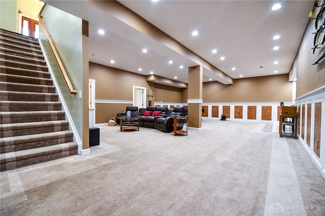 living room with carpet floors, stairway, and recessed lighting