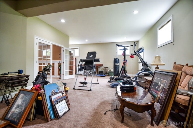 exercise room featuring french doors, carpet, and recessed lighting