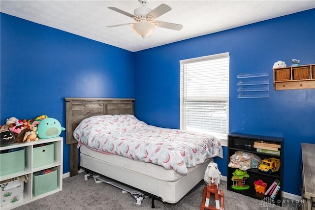 bedroom with carpet, baseboards, and ceiling fan